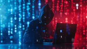 A hacker in a black hoodie with a laptop working on computer network security and cyber attack concepts, the hacker sitting at a table coding with a digital background of binary numbers and light effe