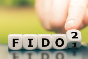 Hand turns a dice and changes the expression "FIDO" to "FIDO"
